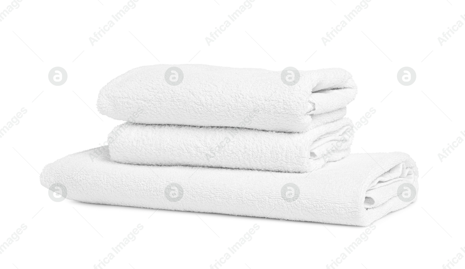 Stack of clean towels isolated on white Photo of Stack of clean towels isolated on white