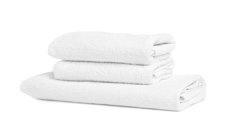 Photo of Stack of clean towels isolated on white