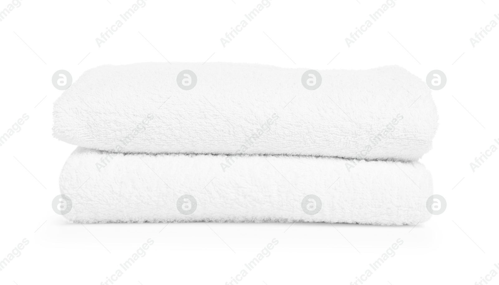 Two folded terry towels isolated on white Photo of Two folded terry towels isolated on white