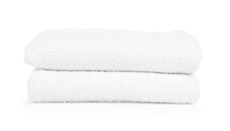 Photo of Two folded terry towels isolated on white