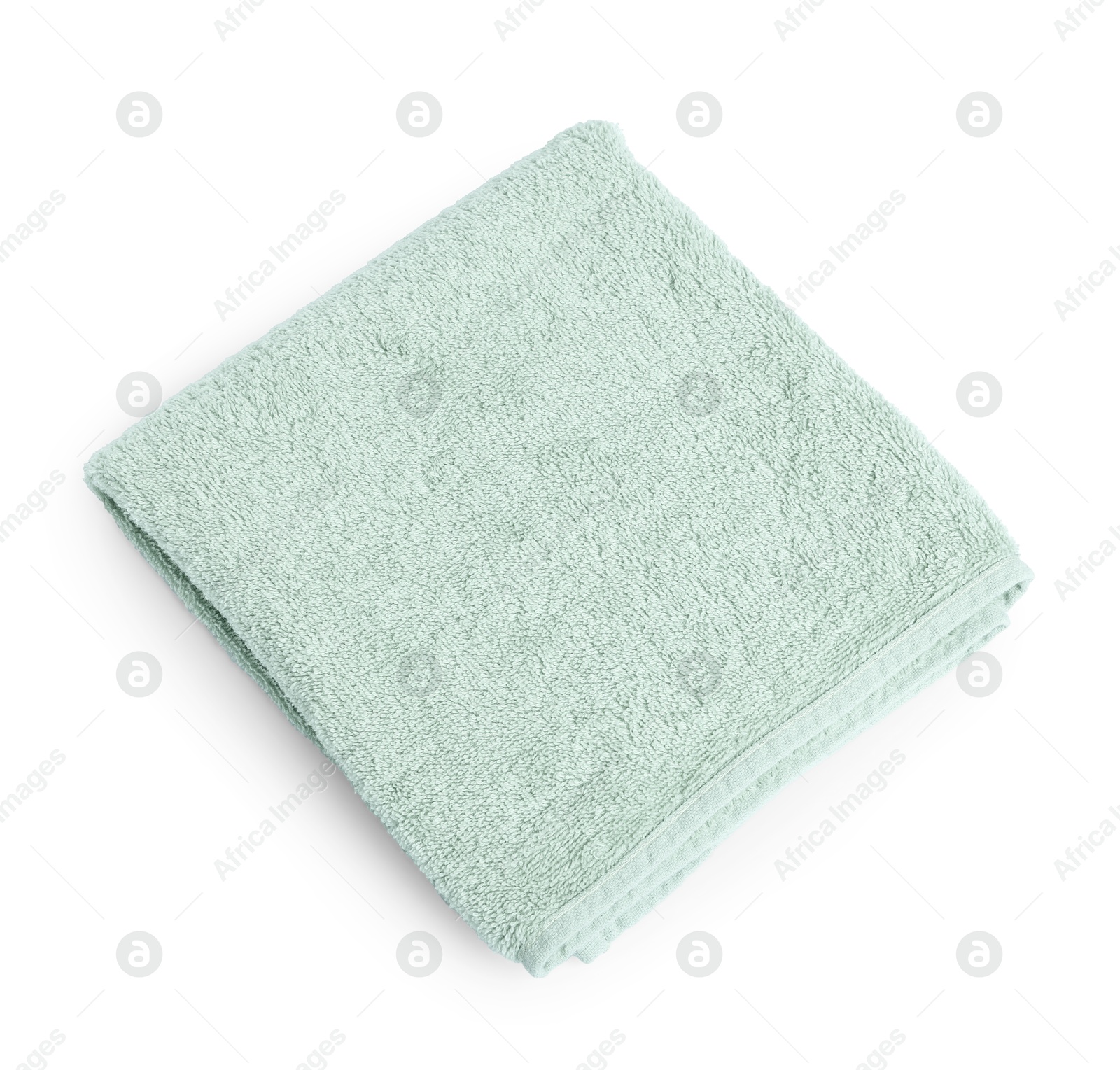 Green towel isolated on white, top view Photo of Green towel isolated on white, top view