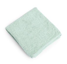 Photo of Green towel isolated on white, top view