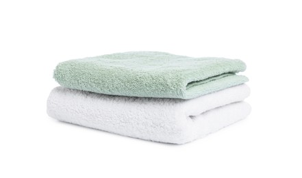 Photo of Two folded terry towels isolated on white