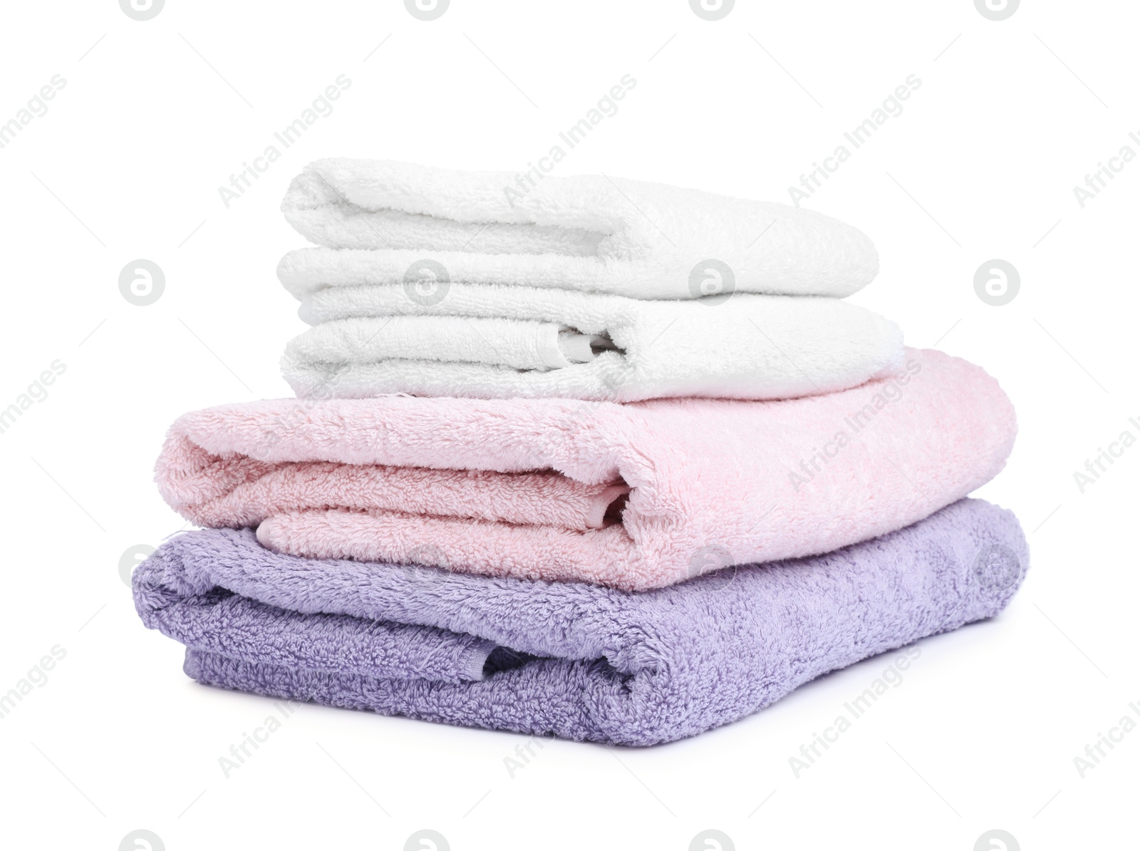 Stack of clean towels isolated on white Photo of Stack of clean towels isolated on white