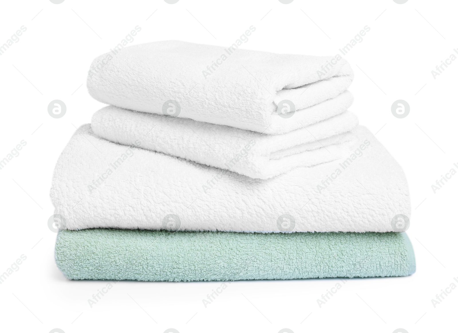 Stack of clean towels isolated on white Photo of Stack of clean towels isolated on white