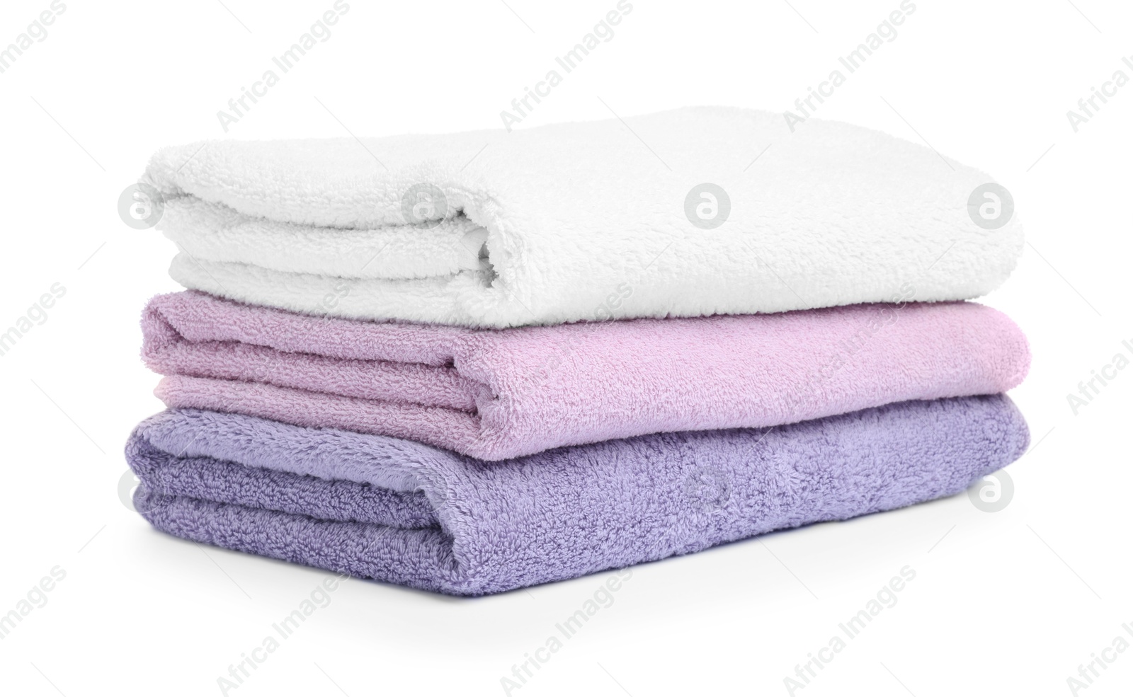 Stack of clean towels isolated on white Photo of Stack of clean towels isolated on white