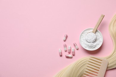 Photo of Collagen capsules, hair lock, powder and comb on pink background, flat lay. Space for text