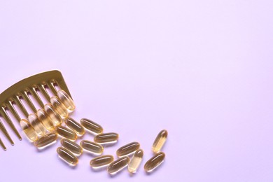 Photo of Collagen capsules and comb on violet background, flat lay. Space for text
