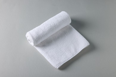 Photo of Clean towel on gray background, above view