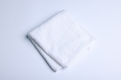 Photo of Clean towel on white background, above view