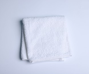 Photo of Clean towel on white background, top view