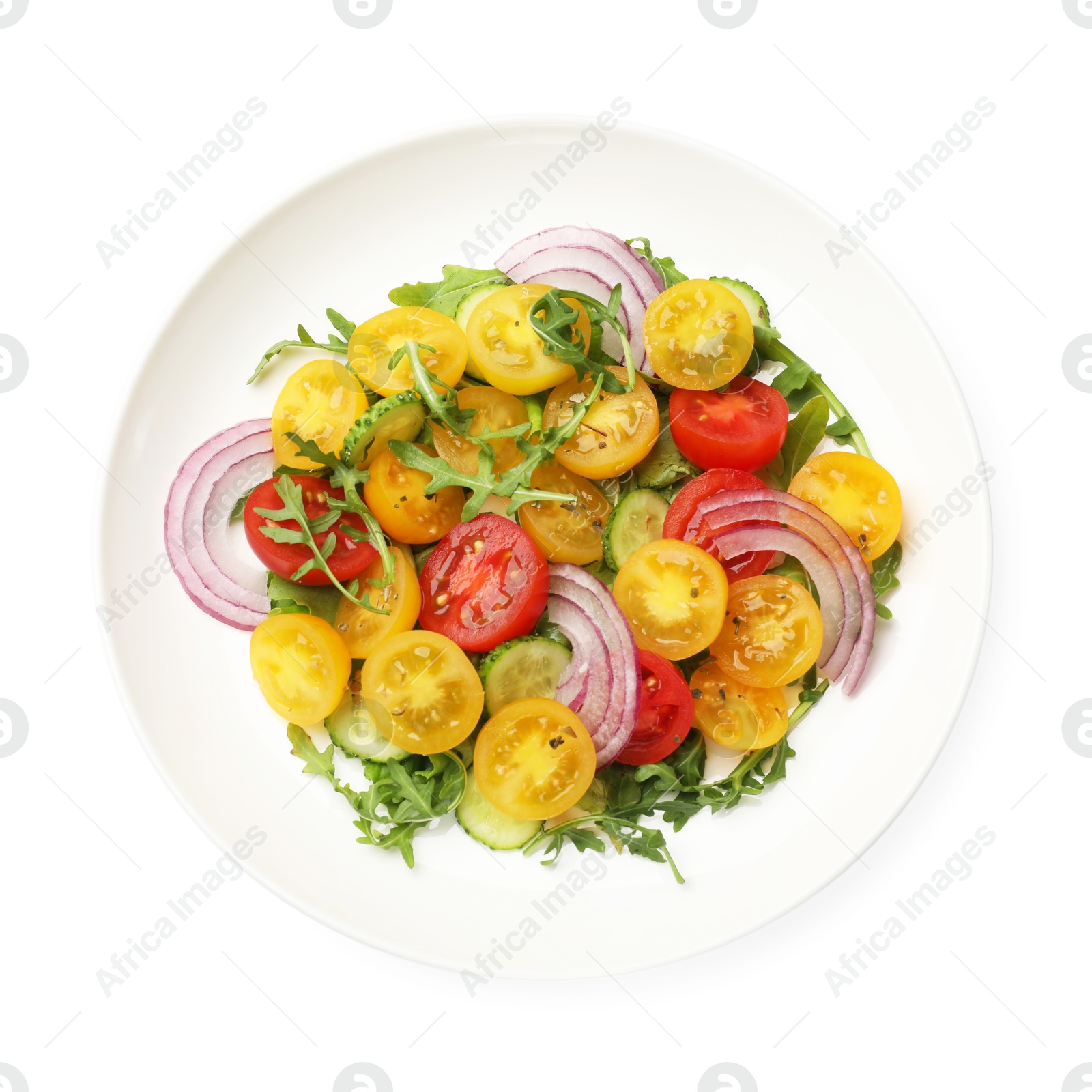 Fresh salad with yellow tomatoes isolated on white, top view Photo of Fresh salad with yellow tomatoes isolated on white, top view