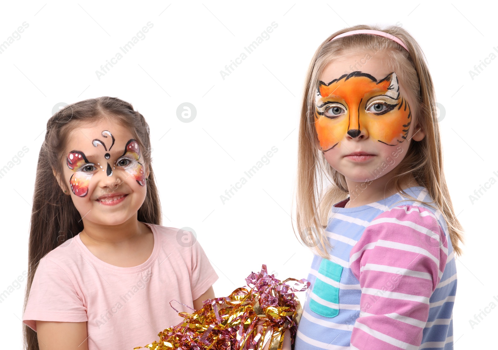Cute girls with colorful face paintings and tinsel on white background Photo of Cute girls with colorful face paintings and tinsel on white background