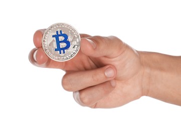 Photo of Cryptocurrency. Man holding bitcoin on white background, closeup