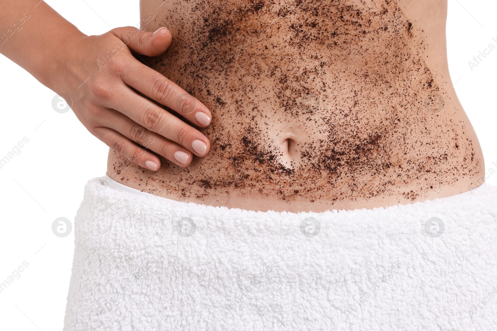 Woman applying body scrub onto her belly against white background, closeup Photo of Woman applying body scrub onto her belly against white background, closeup