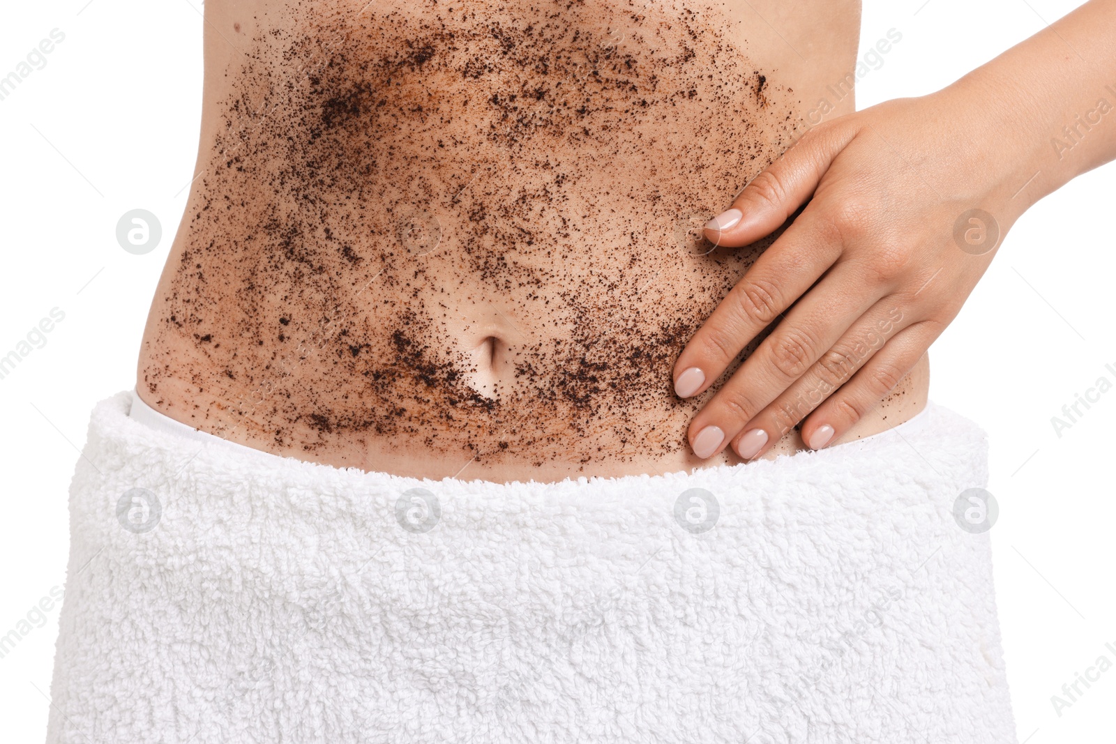 Photo of Woman applying body scrub onto her belly against white background, closeup