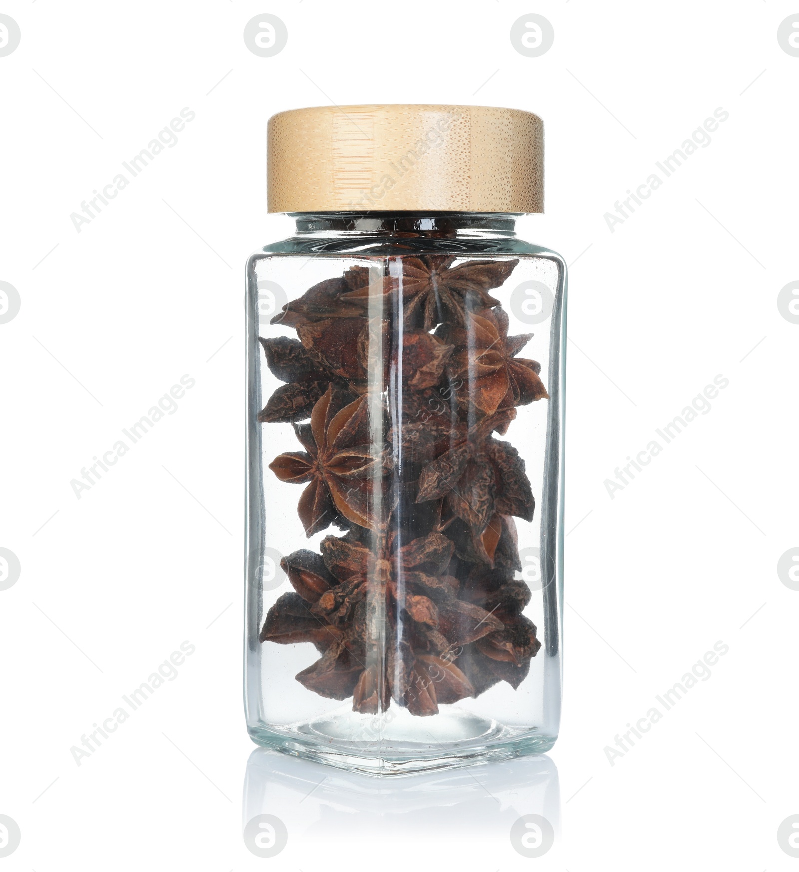 Anise stars in spice jar isolated on white Photo of Anise stars in spice jar isolated on white