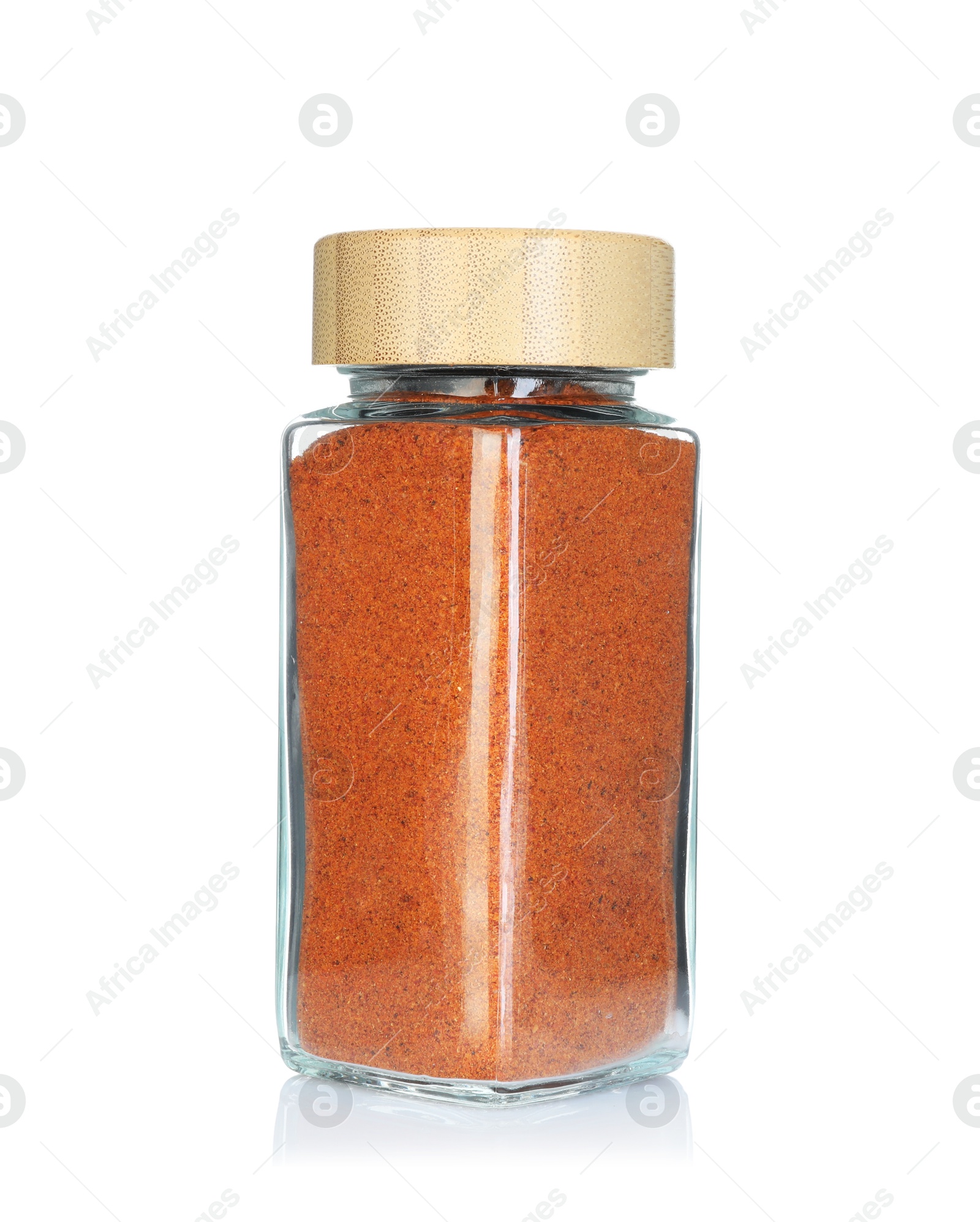 Paprika in spice jar isolated on white Photo of Paprika in spice jar isolated on white