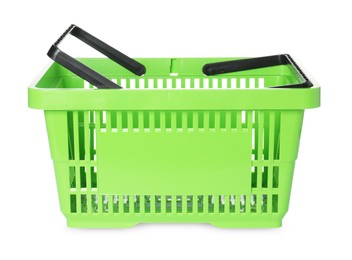 Photo of One green shopping basket isolated on white