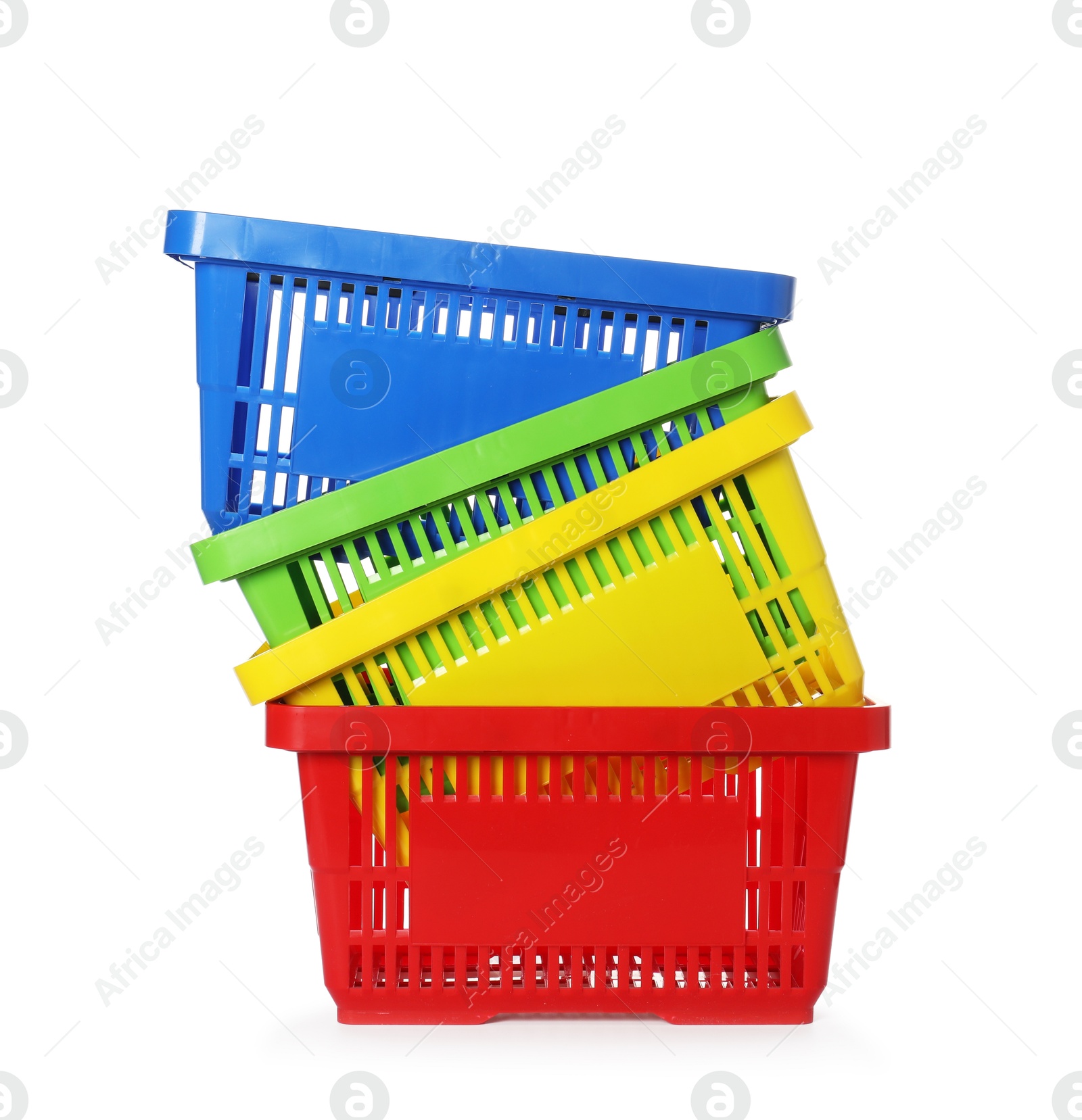 Stack of colorful shopping baskets isolated on white Photo of Stack of colorful shopping baskets isolated on white