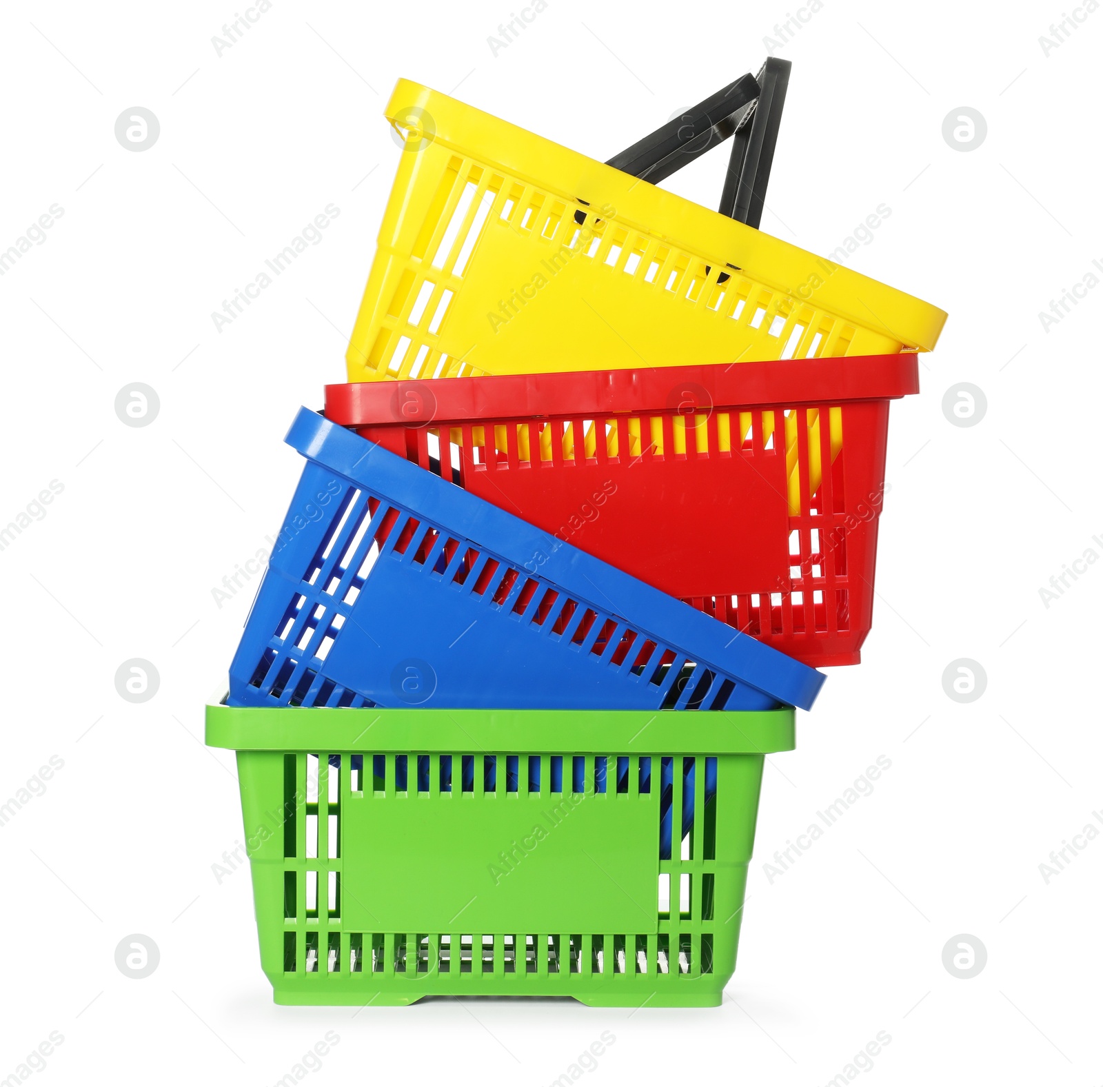Stack of colorful shopping baskets isolated on white Photo of Stack of colorful shopping baskets isolated on white