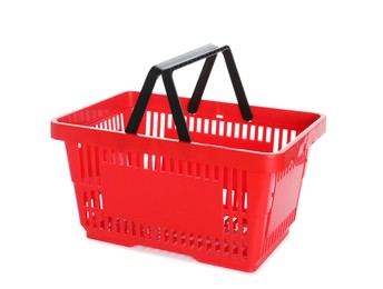 Photo of One red shopping basket isolated on white