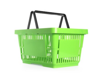 Photo of One green shopping basket isolated on white