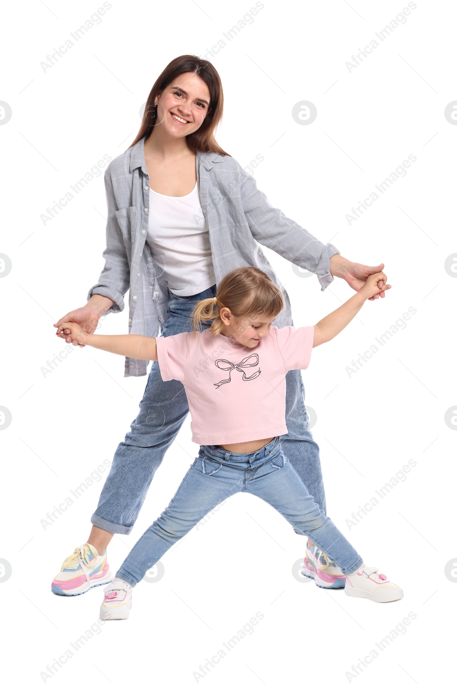 Happy mother and her cute daughter on white background Photo of Happy mother and her cute daughter on white background