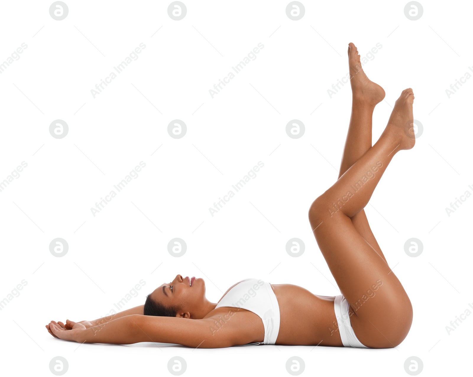 Woman in underwear with smooth skin after epilation procedure on white background Photo of Woman in underwear with smooth skin after epilation procedure on white background