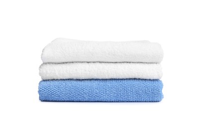 Photo of Stack of clean towels isolated on white