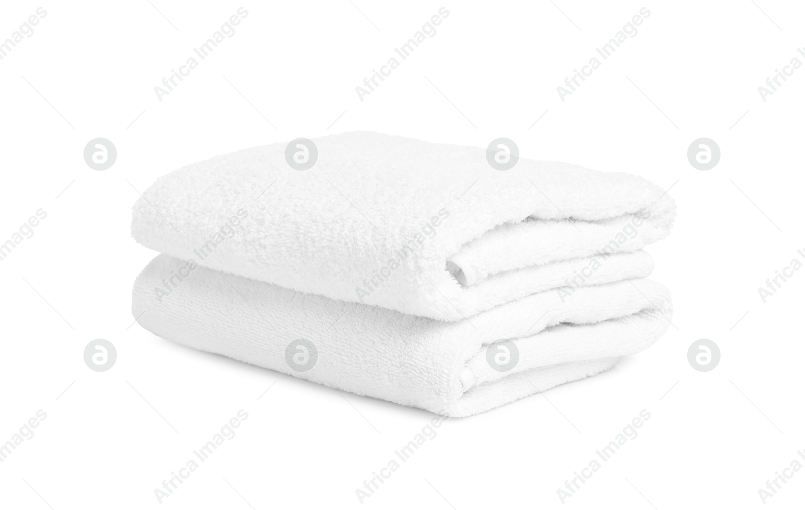 Two folded terry towels isolated on white Photo of Two folded terry towels isolated on white