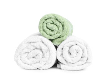 Photo of Many folded terry towels isolated on white
