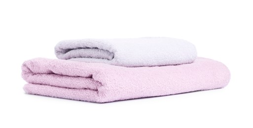 Photo of Two folded terry towels isolated on white
