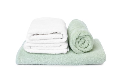 Photo of Many folded terry towels isolated on white
