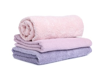 Photo of Many folded terry towels isolated on white