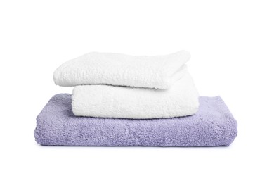 Photo of Many folded terry towels isolated on white