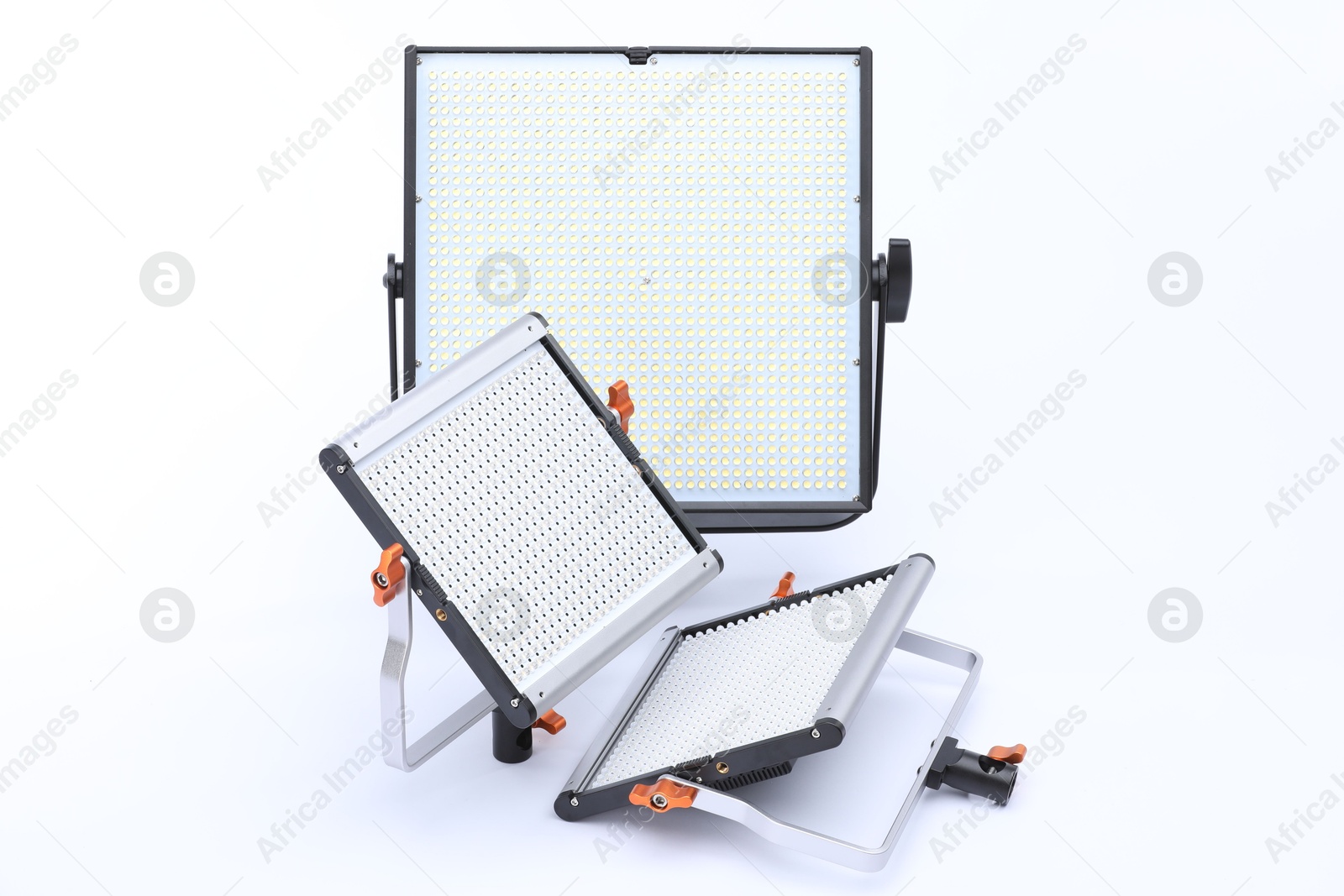 Photo of Professional lighting equipment. LED lamps isolated on white