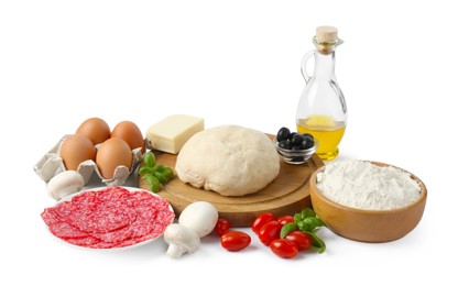 Photo of Making pizza. Different ingredients isolated on white