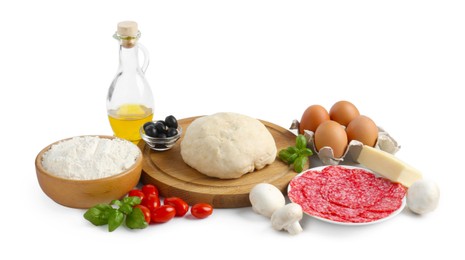 Photo of Making pizza. Different ingredients isolated on white