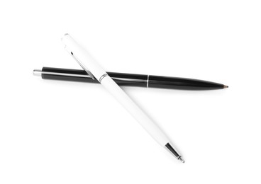 Photo of Stylish pens isolated on white, above view