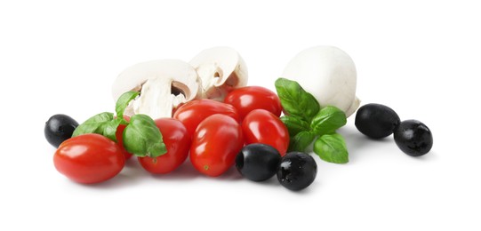 Photo of Making pizza. Different ingredients isolated on white
