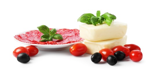Photo of Making pizza. Different ingredients isolated on white