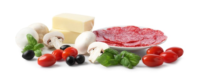 Photo of Making pizza. Different ingredients isolated on white
