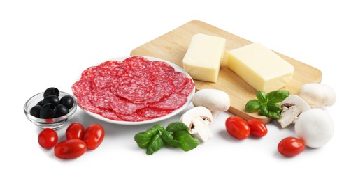 Photo of Making pizza. Different ingredients isolated on white