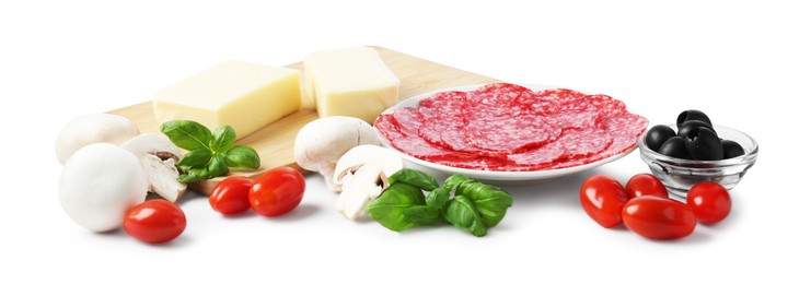 Photo of Making pizza. Different ingredients isolated on white