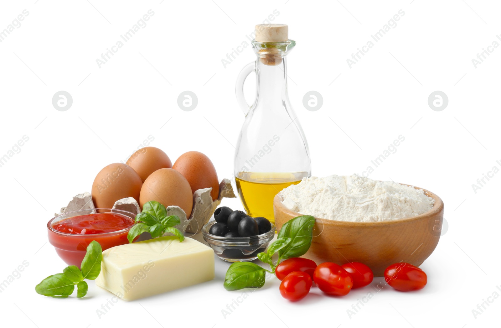 Photo of Making pizza. Different ingredients isolated on white