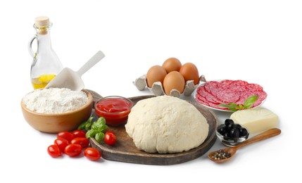 Photo of Making pizza. Different ingredients isolated on white