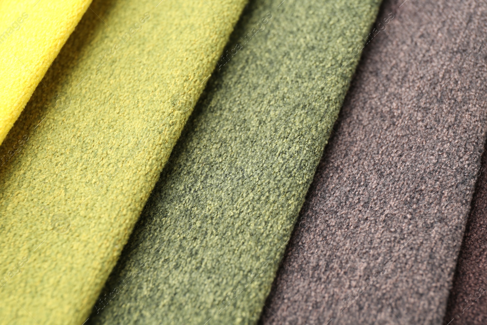 Samples of different fabrics as background, closeup Photo of Samples of different fabrics as background, closeup