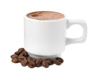 Photo of Aromatic coffee in cup and beans isolated on white