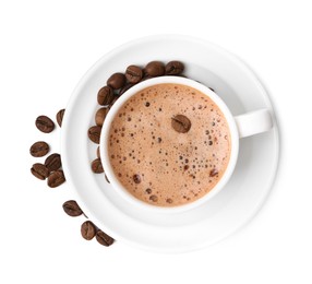 Photo of Aromatic coffee in cup, beans and saucer isolated on white, top view